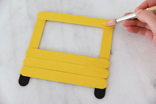 Painting popsicle stick bus