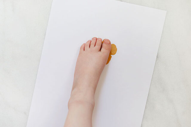 Foot stamping on paper