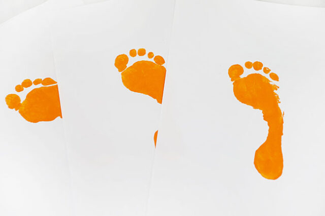 Painted orange footprints