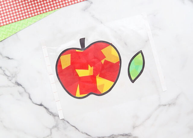 Sealed apple in laminating sheet