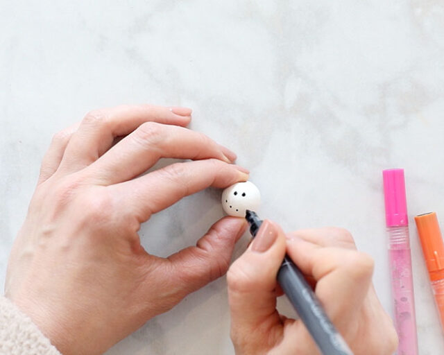 Drawing faces onto beads