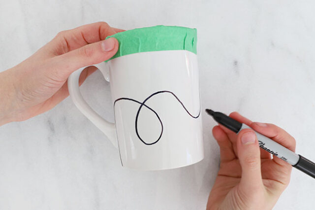 Drawing wire onto mug