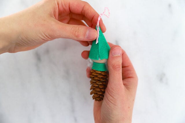 String loop glued onto back of ornament