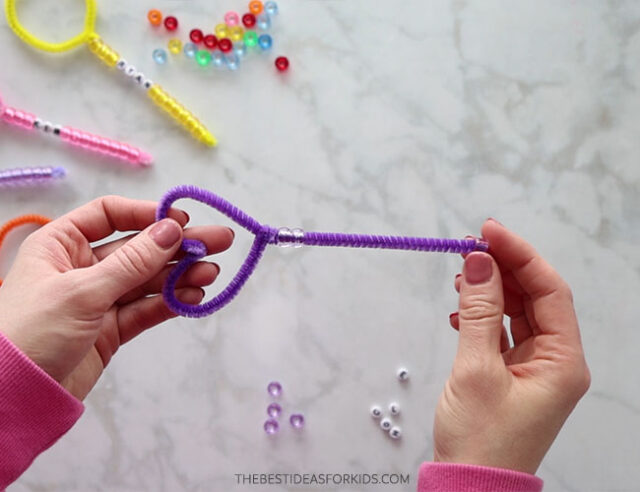 Add Pony Beads to Pipe Cleaners